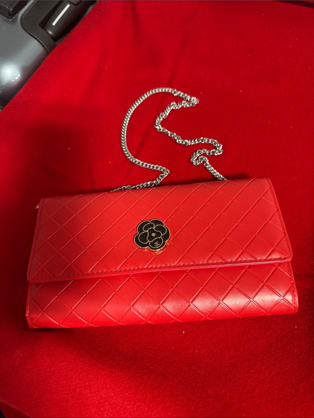 Quilted clutch with strap